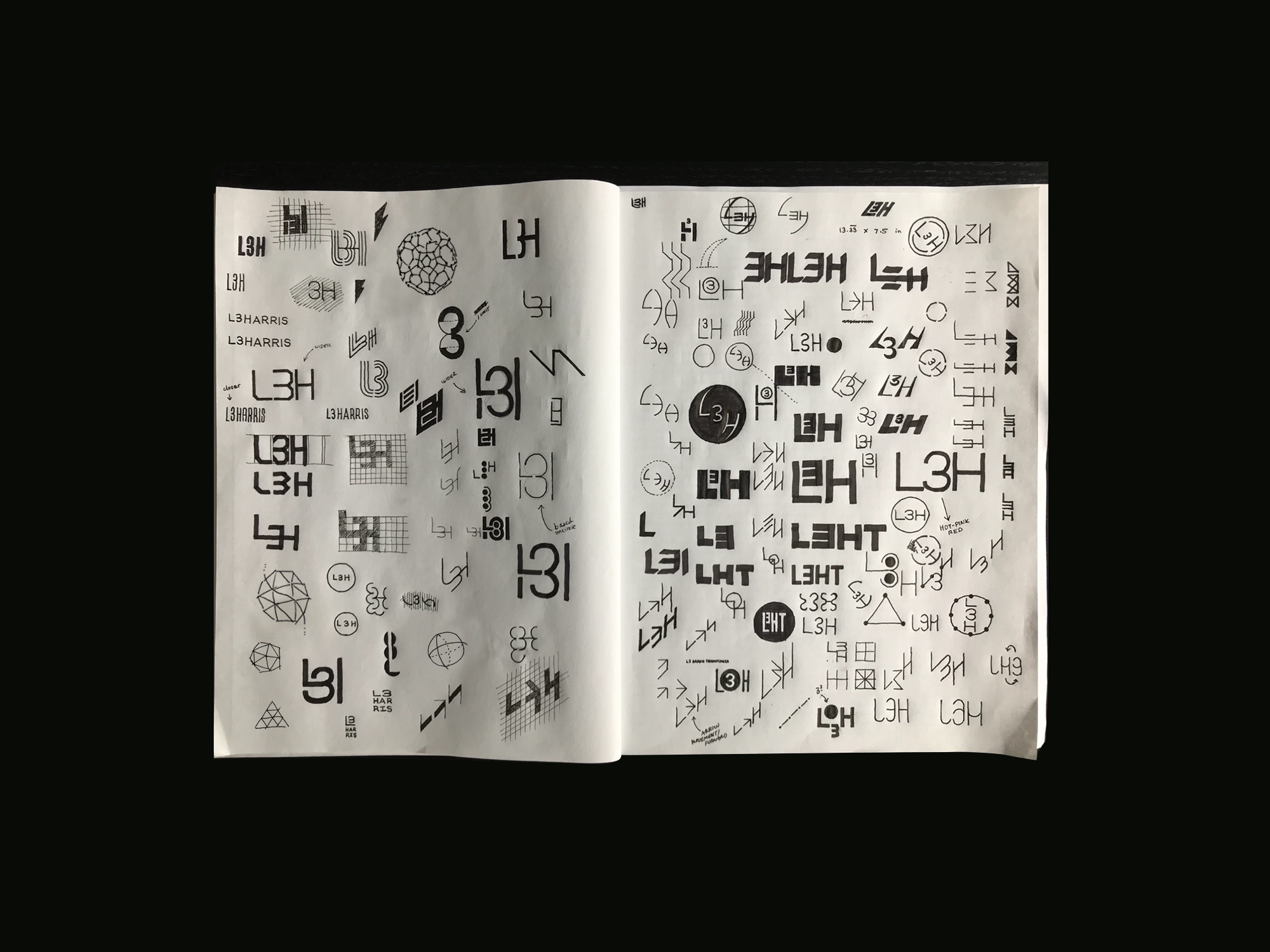 Sketchbook of logo concepts for L3Harris